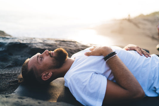 Person taking a calm mindful breathing break during a busy day