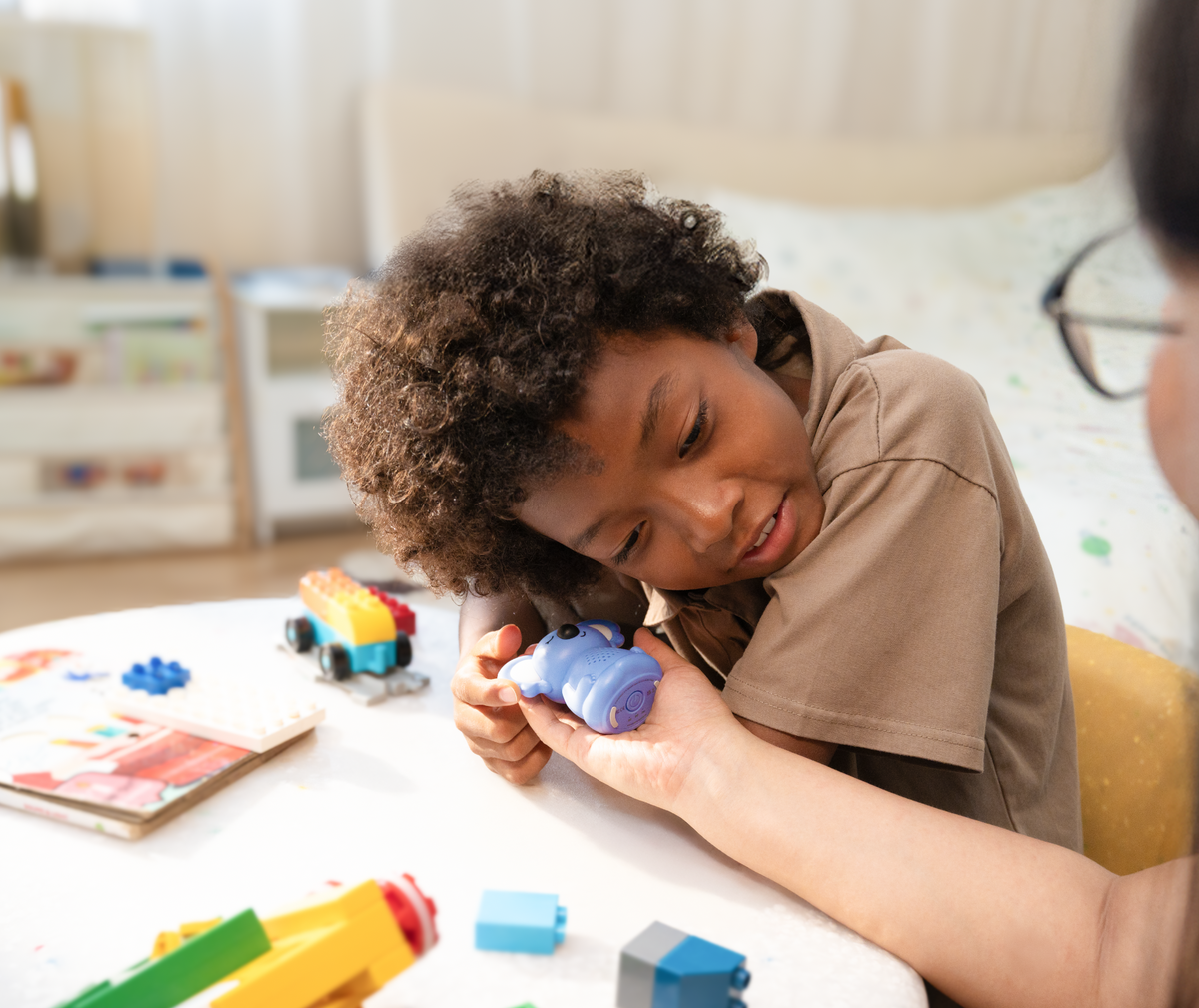 A Pal at home with a child